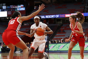 Syracuse defeated No. 18 Ohio State, 97-91, its first defeat over a ranked opponent this season.